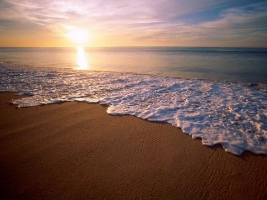 fond-ecran-coucher-de-soleil-sur-la-mer.jpg